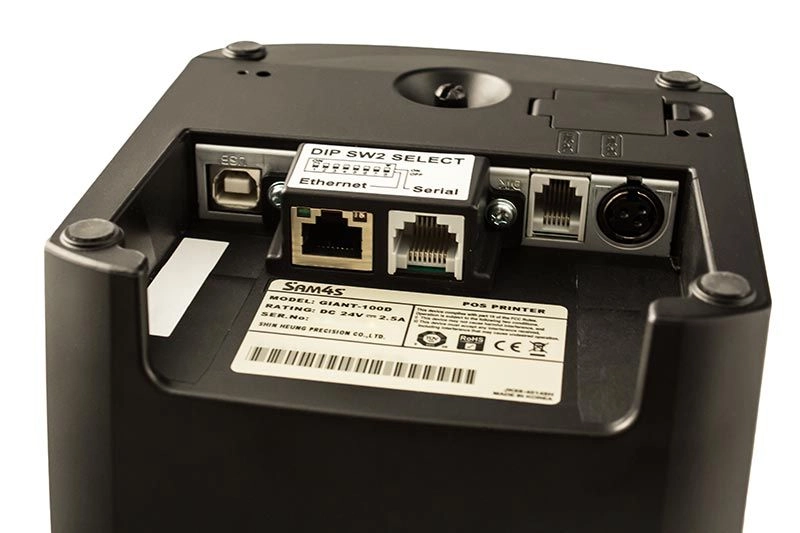Unterseite des schwarzen MagicPOS Sam4S Giant-100 Bondruckers mit USB-, Ethernet- und seriellen RS-232-Anschlüssen für POS-Kassenplätze