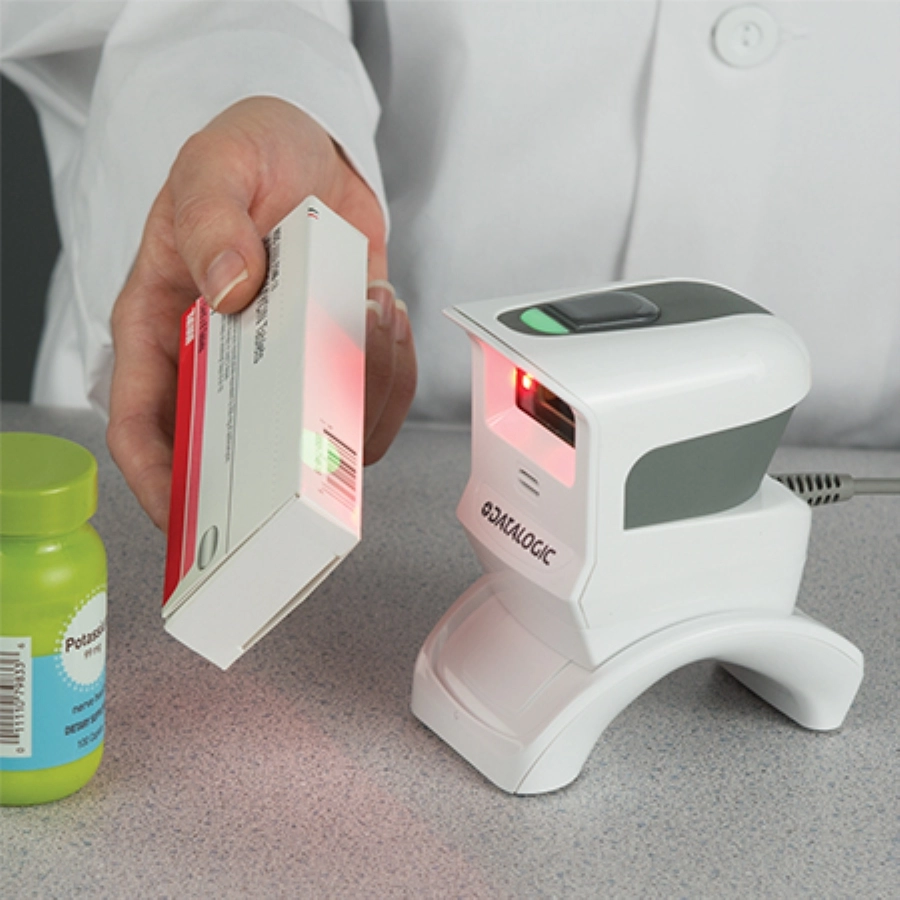 Datalogic Gryphon GPS4400 white USB 1D/2D presentation scanner reading pharmacy medicine codes for SecurPharm QR and DataMatrix scanning