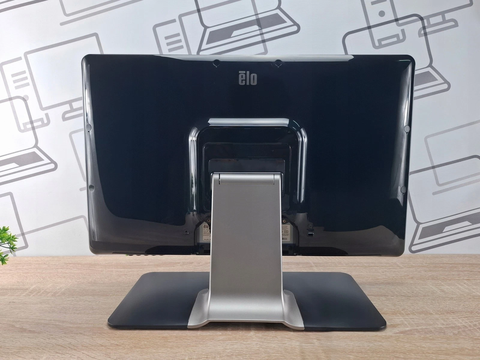 Refurbished 22-inch EloTouch 2201L E382790 black Full HD SAW USB touch monitor shown from the rear with stand, ideal for retail and hospitality.