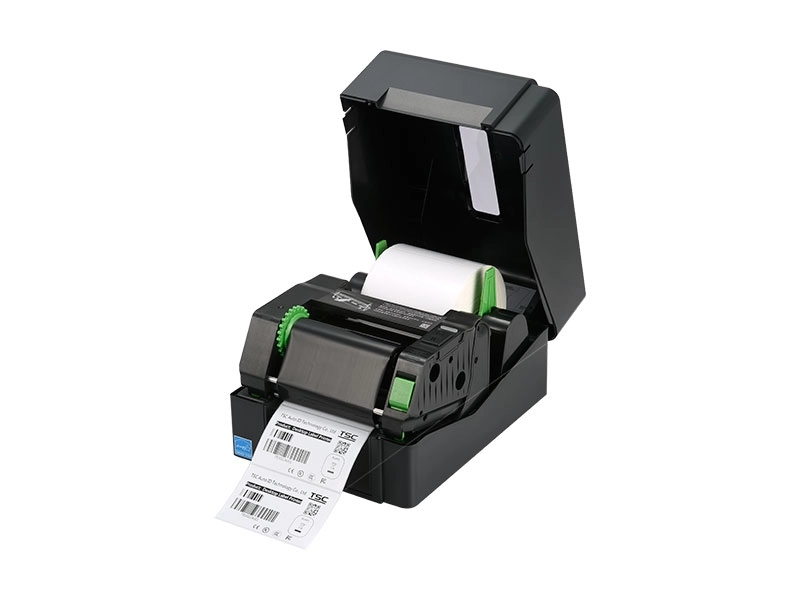 TSC TE310 300 dpi thermal transfer label printer with open cover, printing barcode labels for office, warehouse, shipping and retail use.